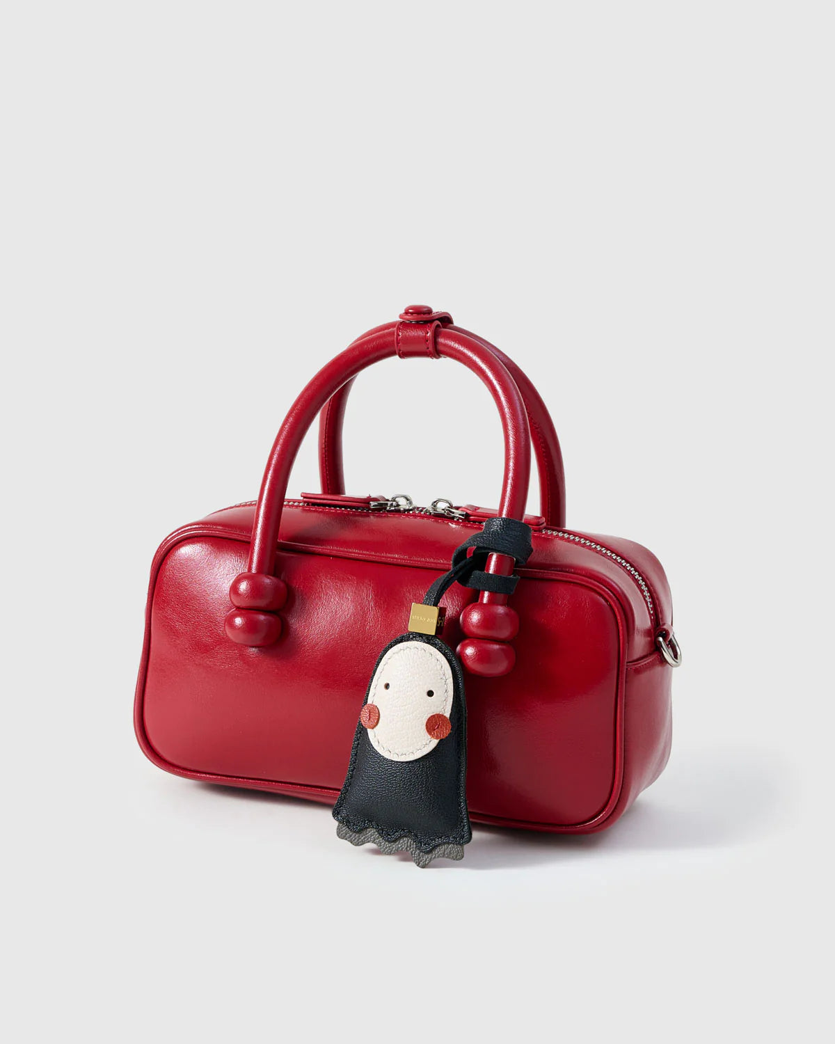NO FACE CHARM