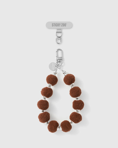 BROWN POM PHONE STRAP