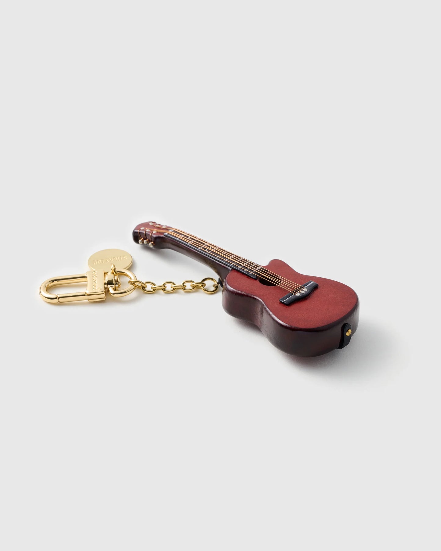CUTAWAY GUITAR CHARM | 1 of 1