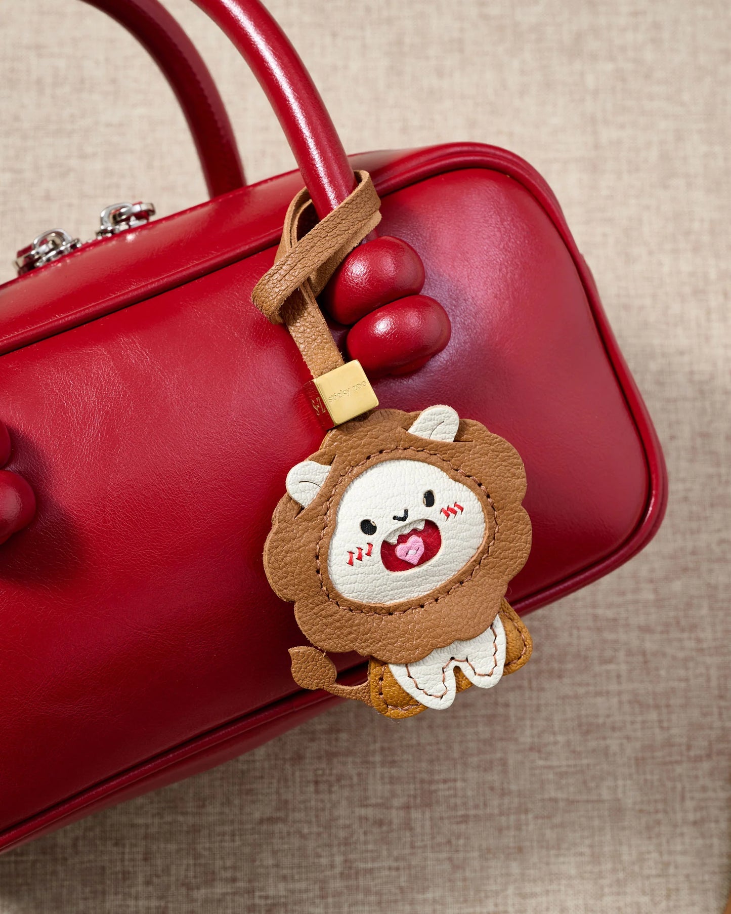 LION CHARM