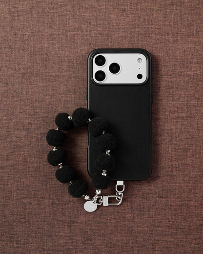 BLACK POM PHONE STRAP