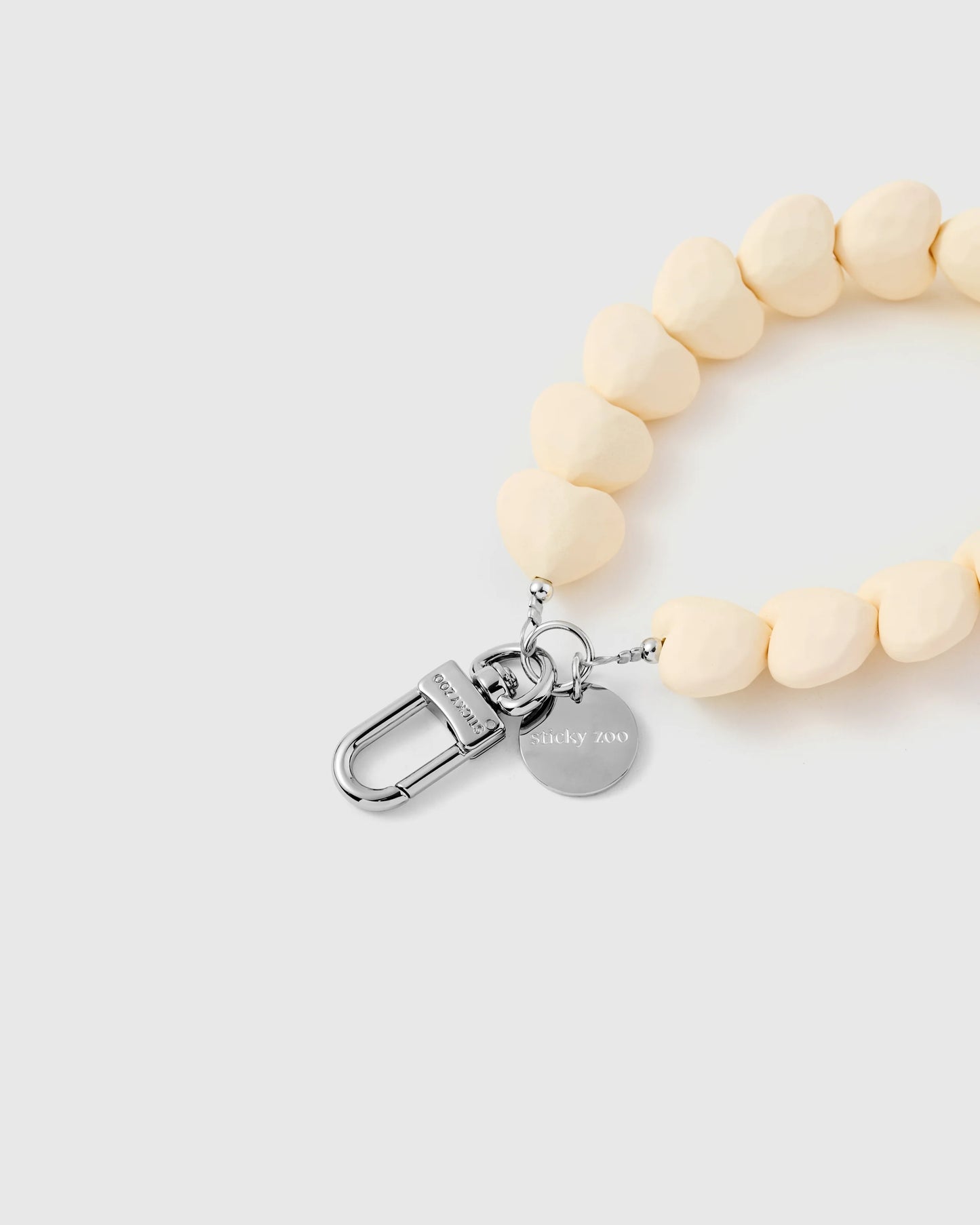 CREAM HEART PHONE STRAP