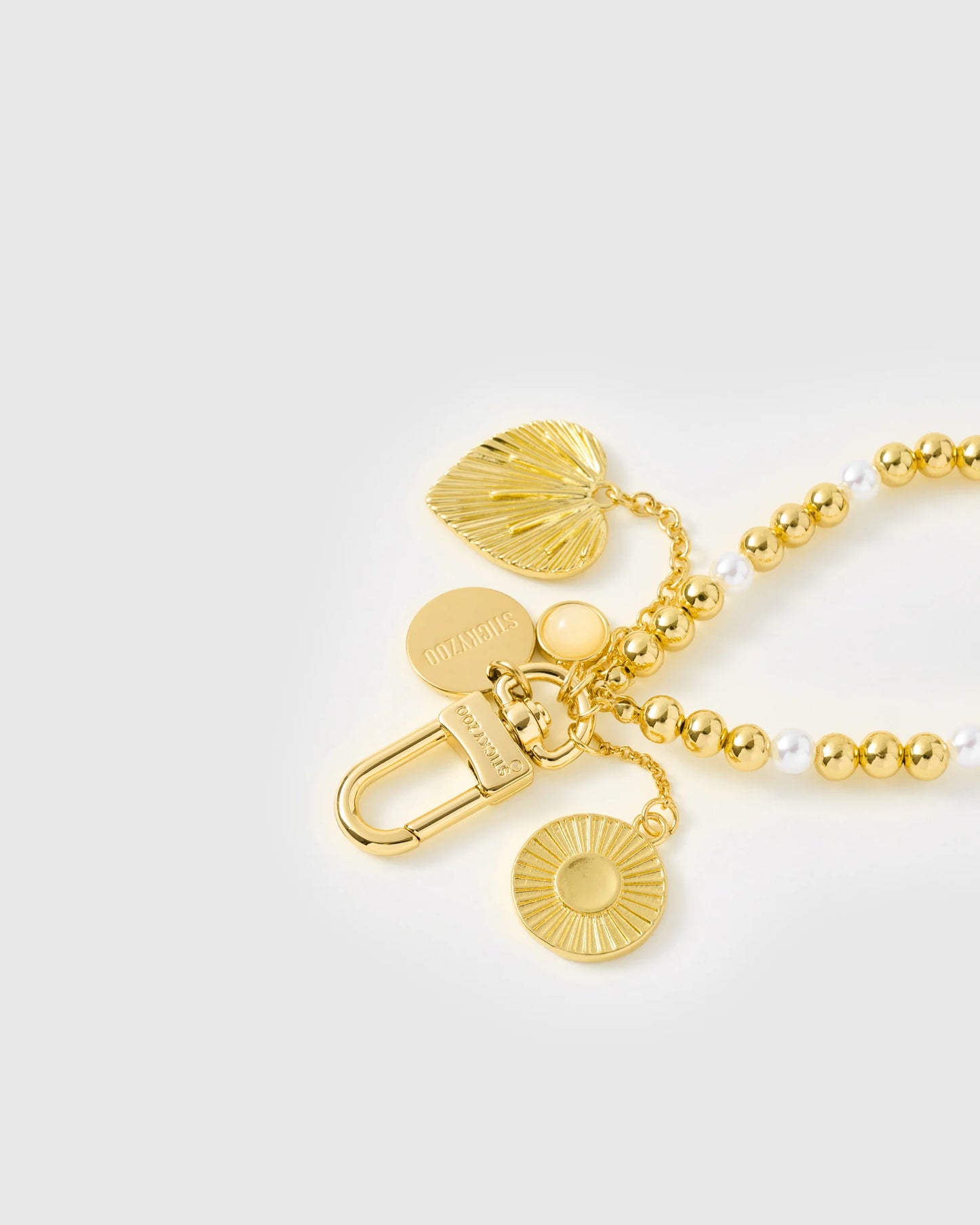 GOLDEN ORBIT PEARL PHONE STRAP