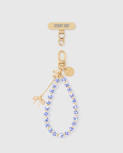 PORCELAIN BLOOM CHARM PHONE STRAP