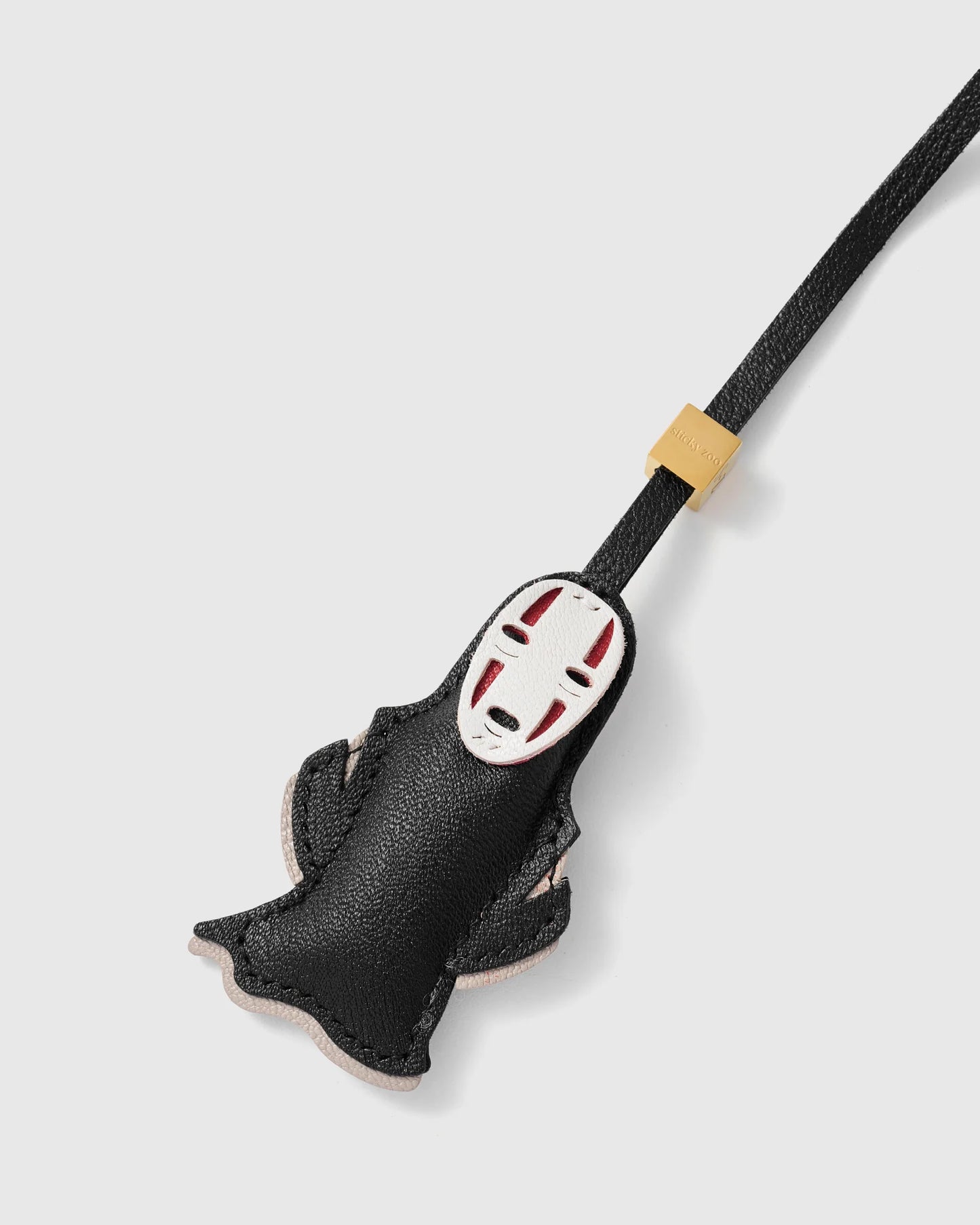 NO FACE CHARM