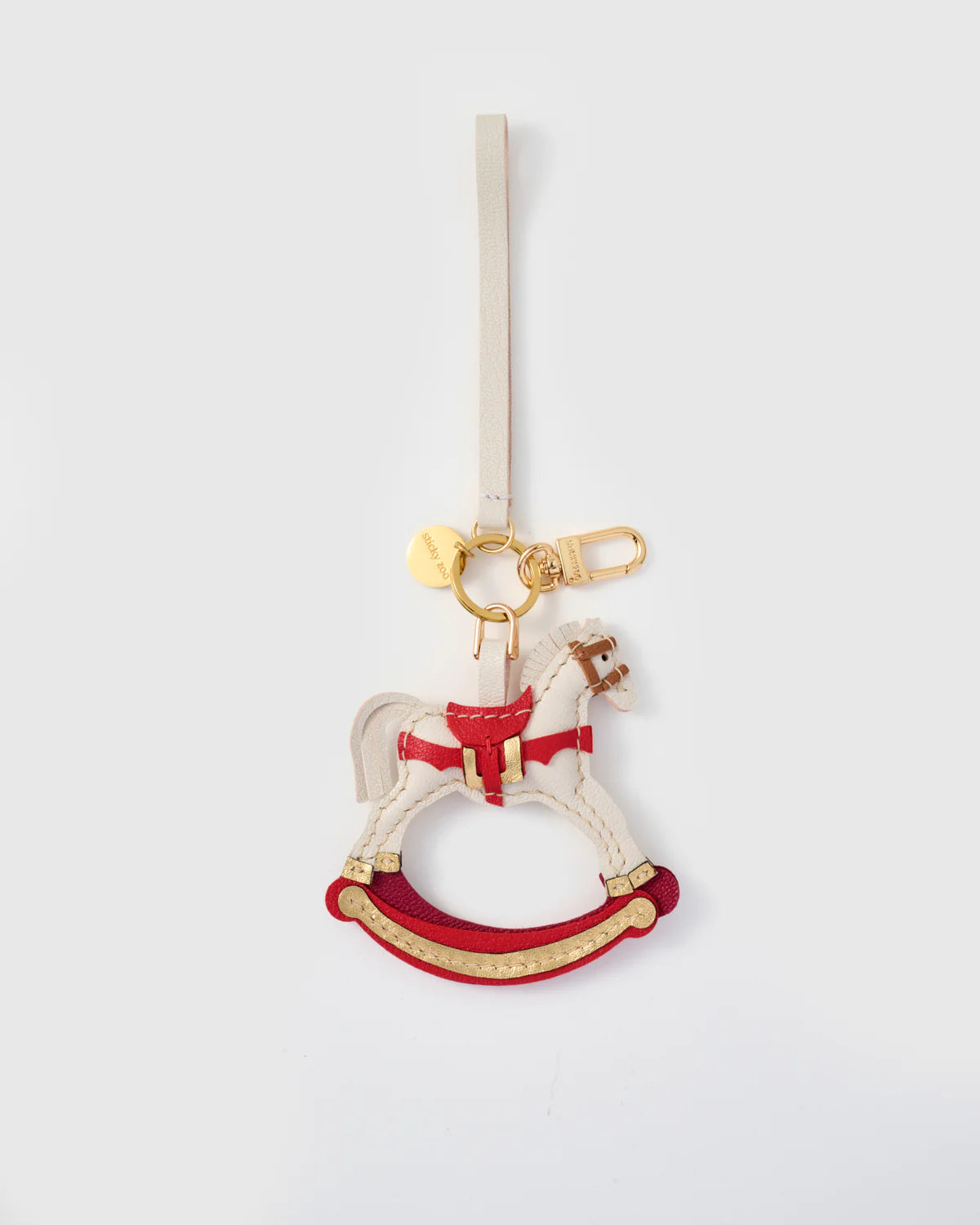 THE ROCKING HORSE CHARM
