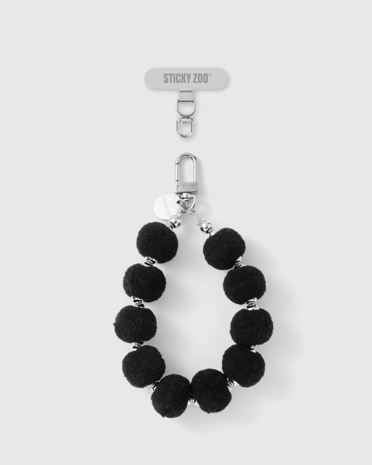 BLACK POM PHONE STRAP