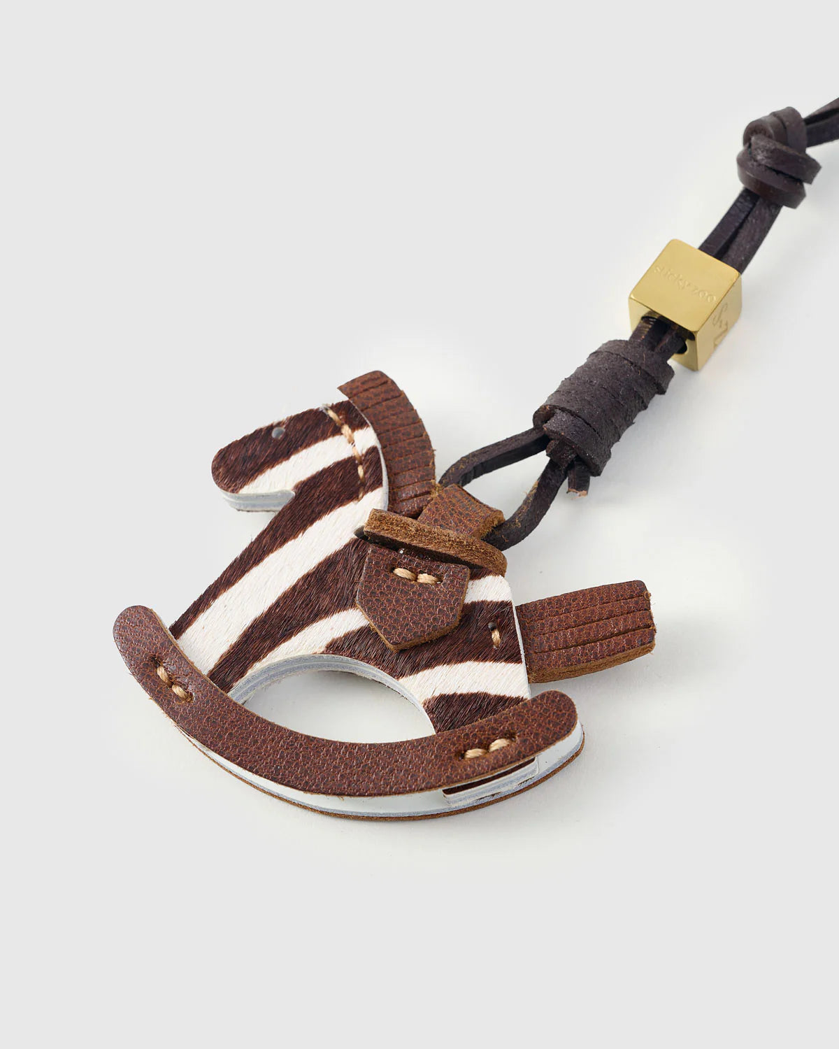 ZEBRA RIDE STACK CHARM